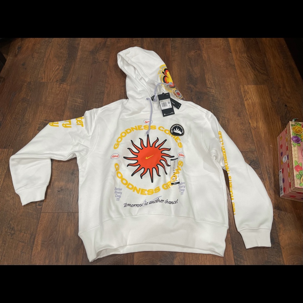 Nike White Hoodie with Red & Yellow Sun Graphic